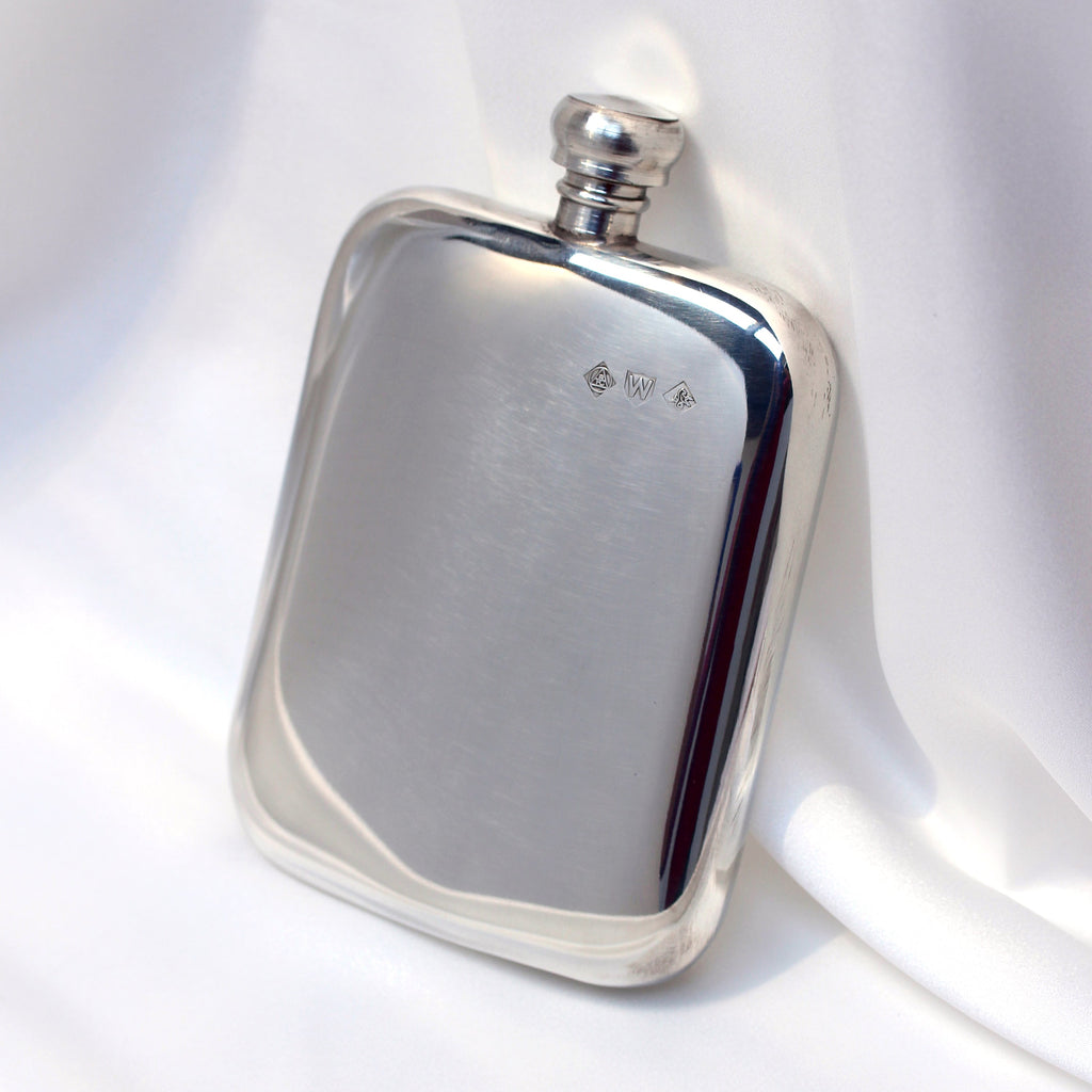 Polished metal finish example of a pewter hipflask